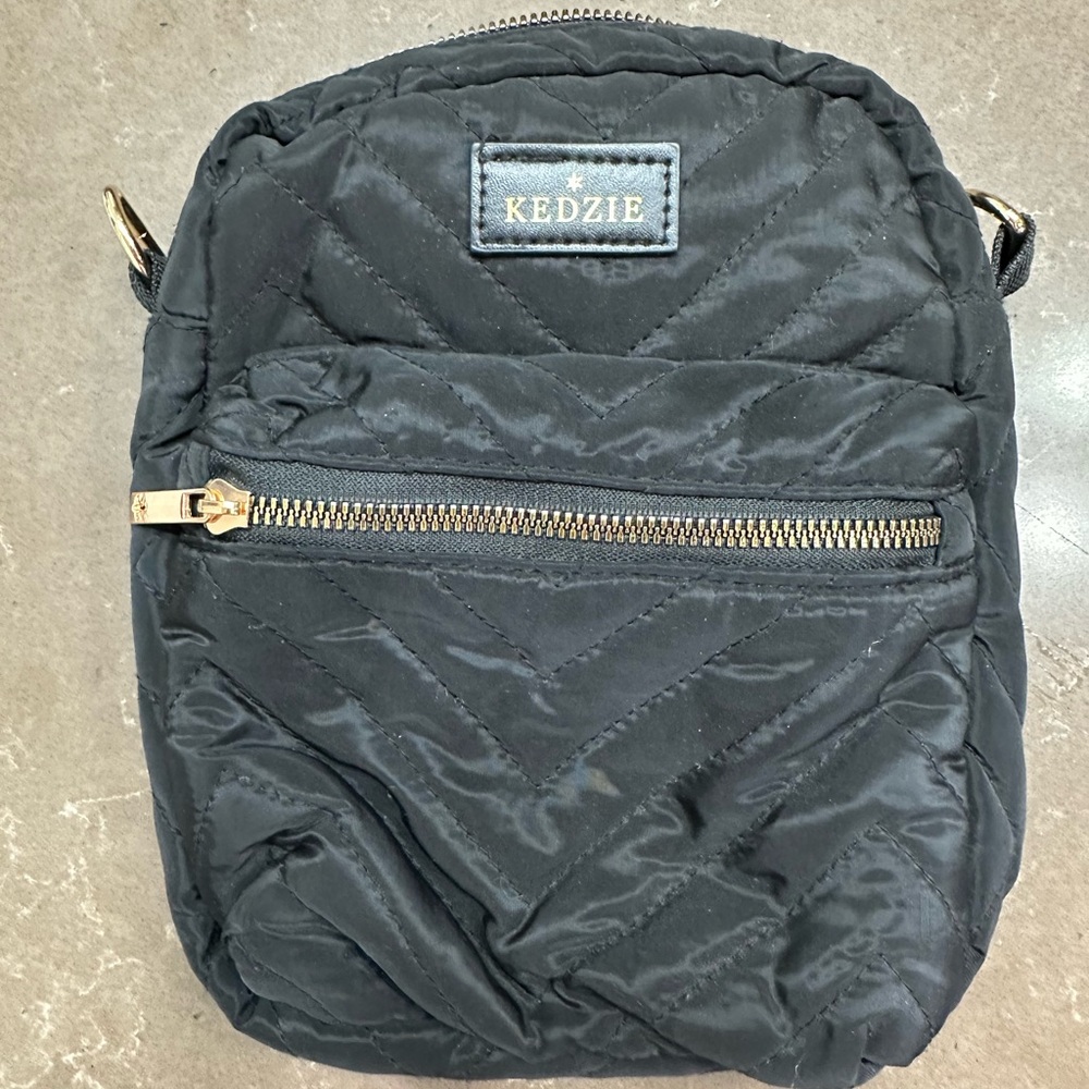 Gold and Black Crossbody Bag with Quilted Texture and Zipper Closure